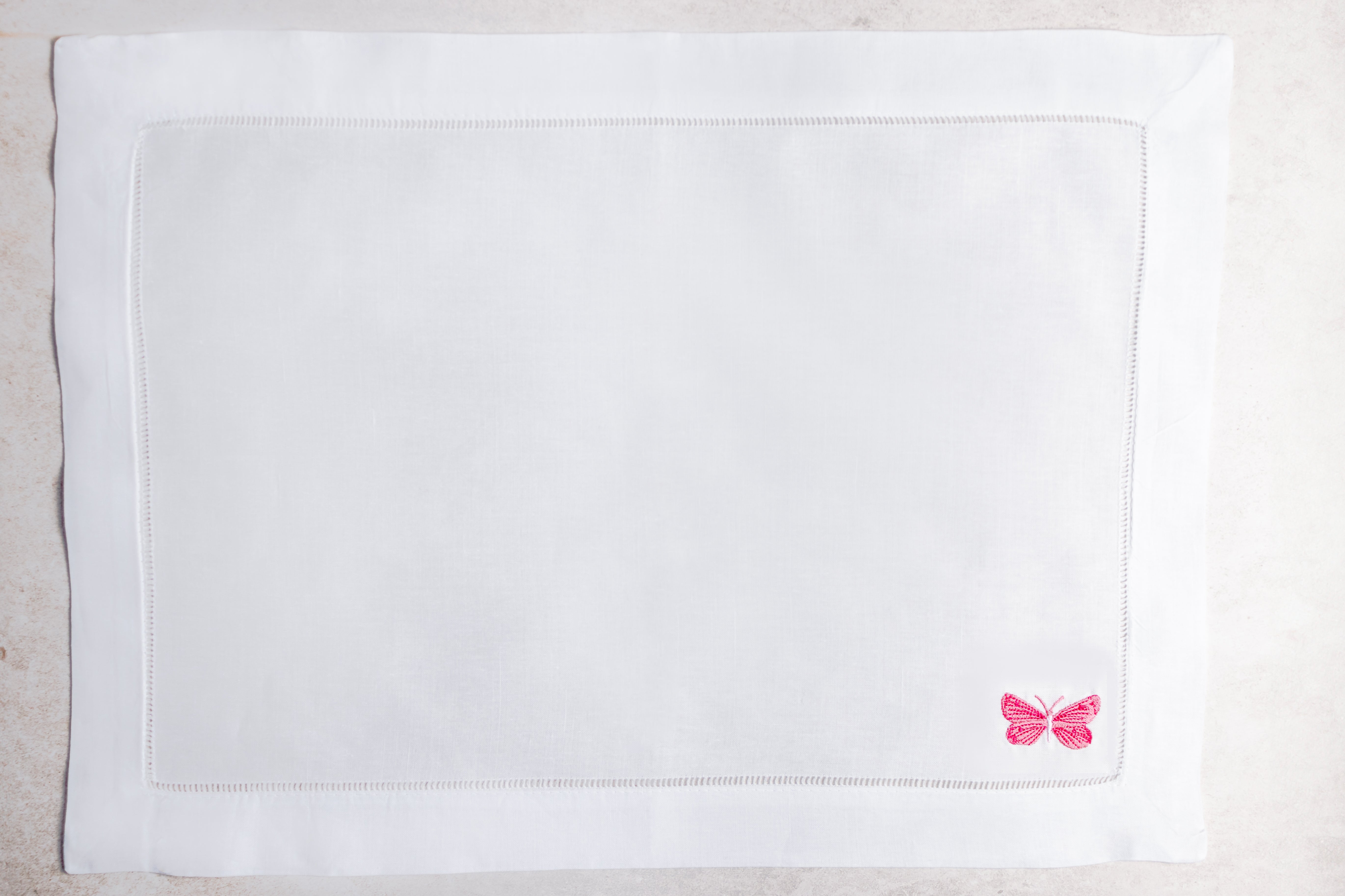 Mantel individual de lino