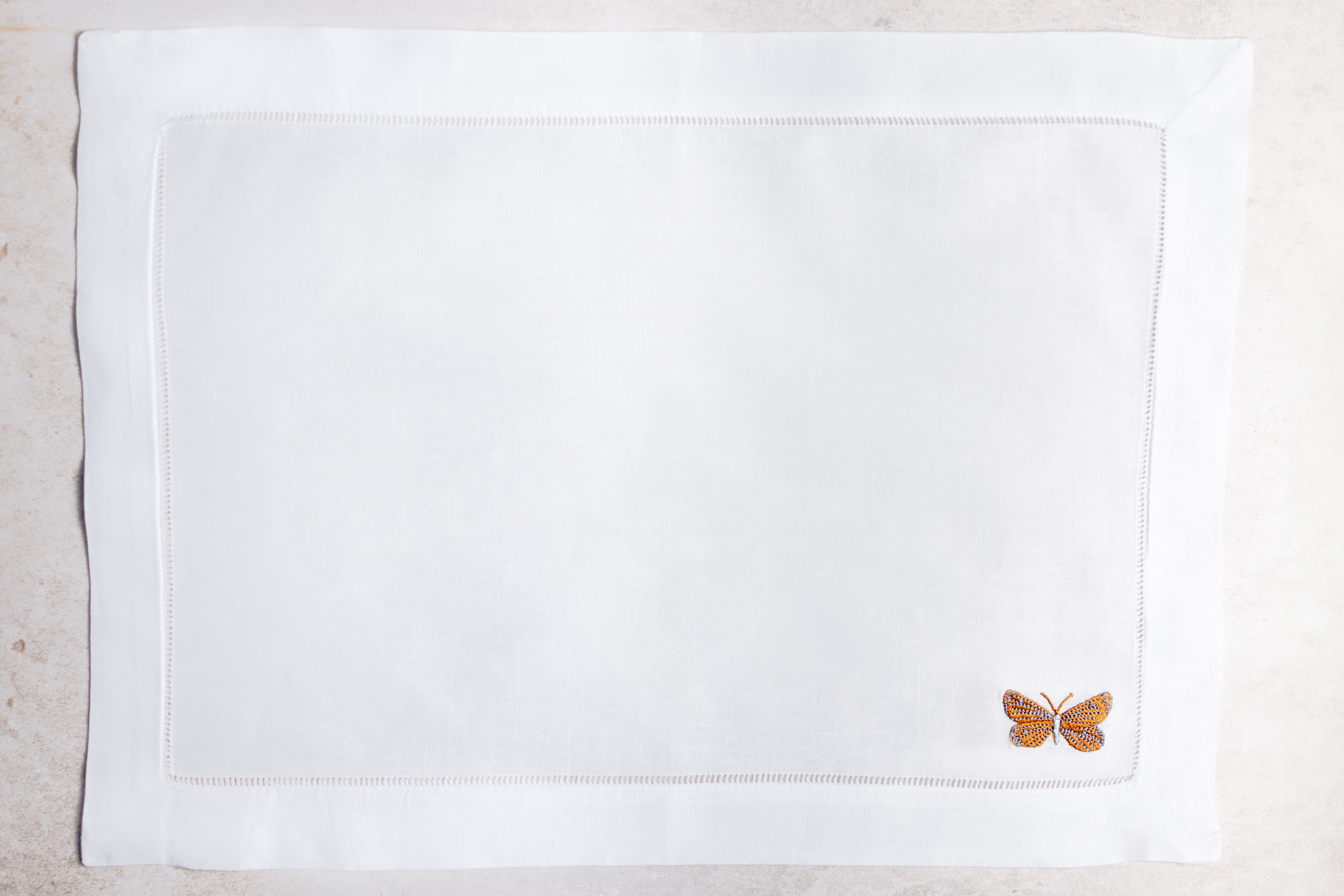 Mantel individual de lino