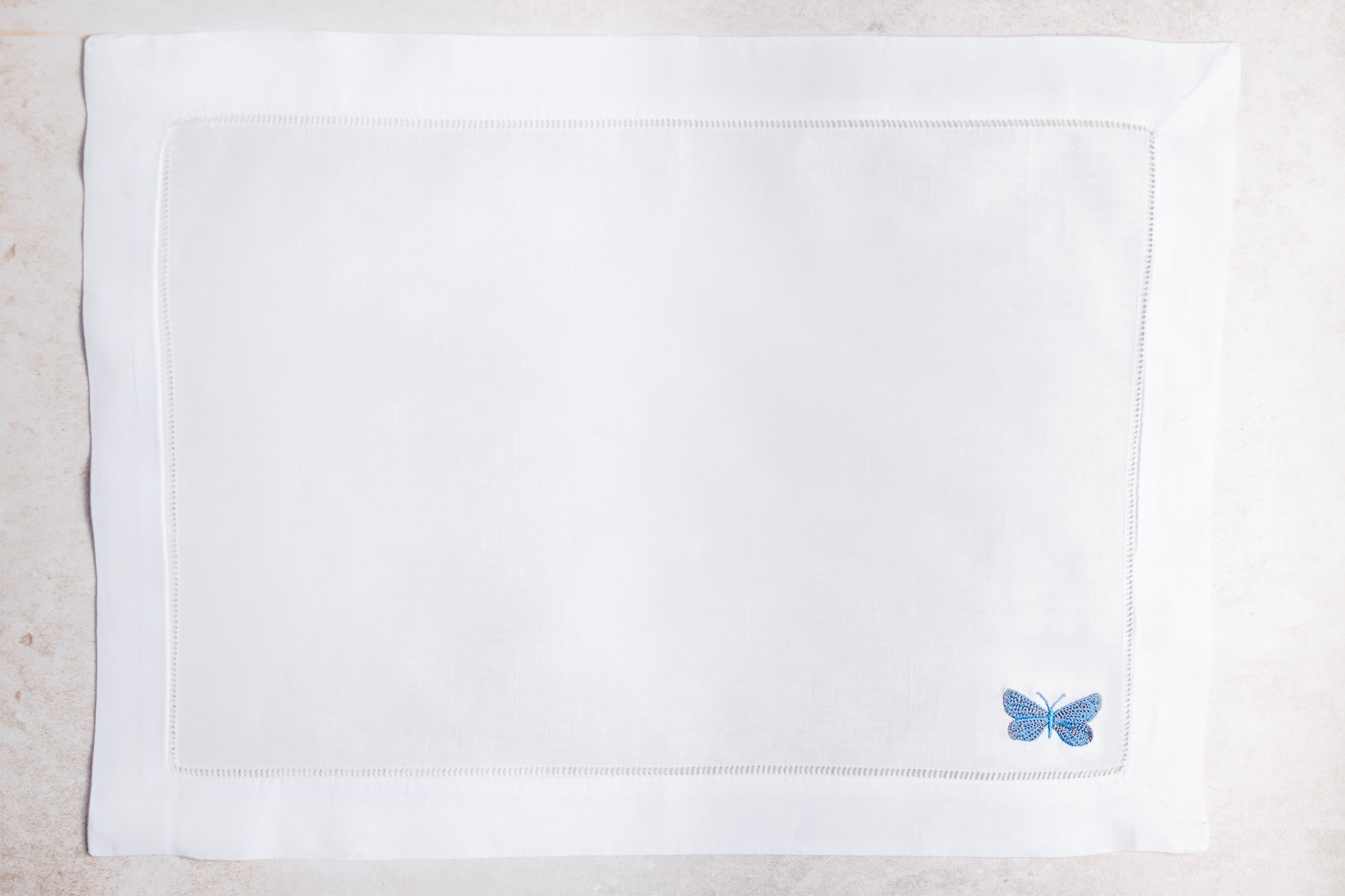 Mantel individual de lino