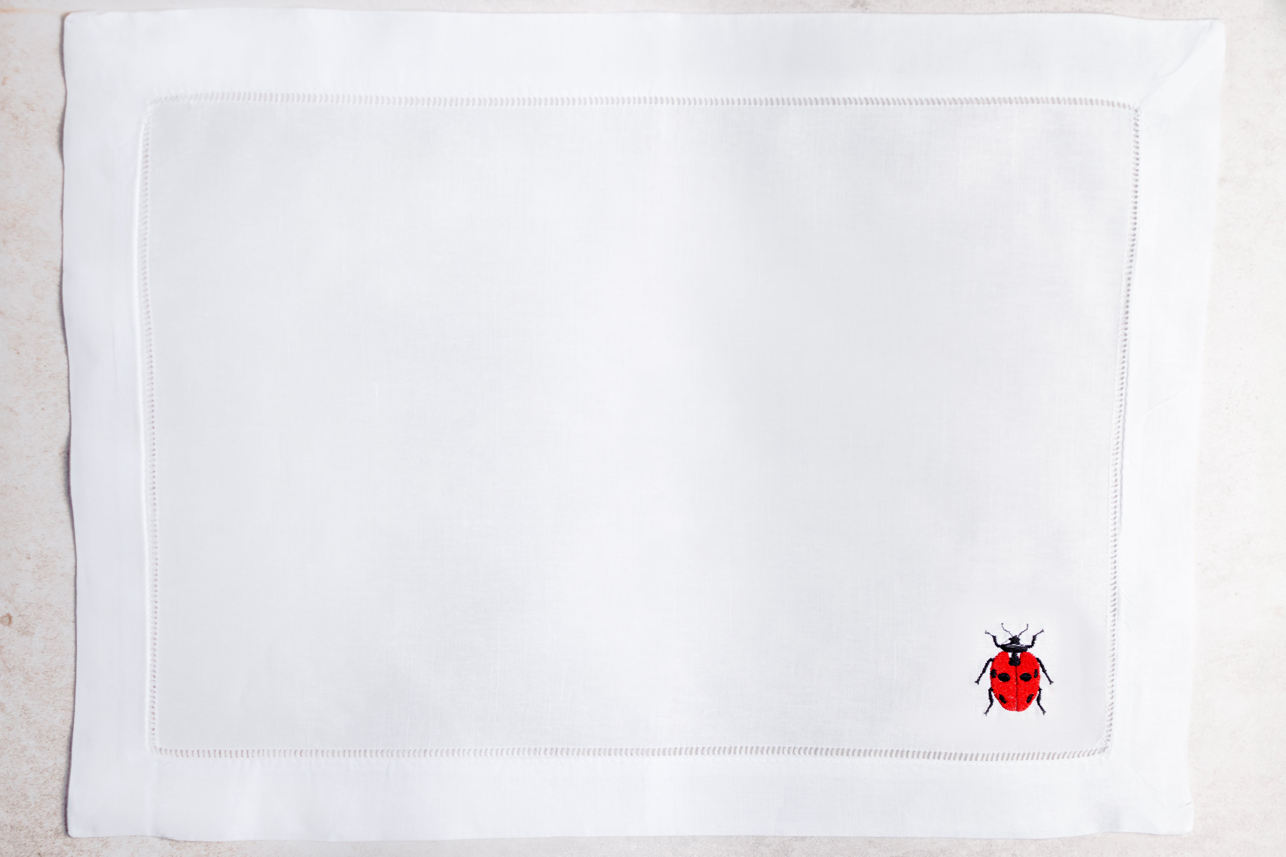 Mantel individual de lino