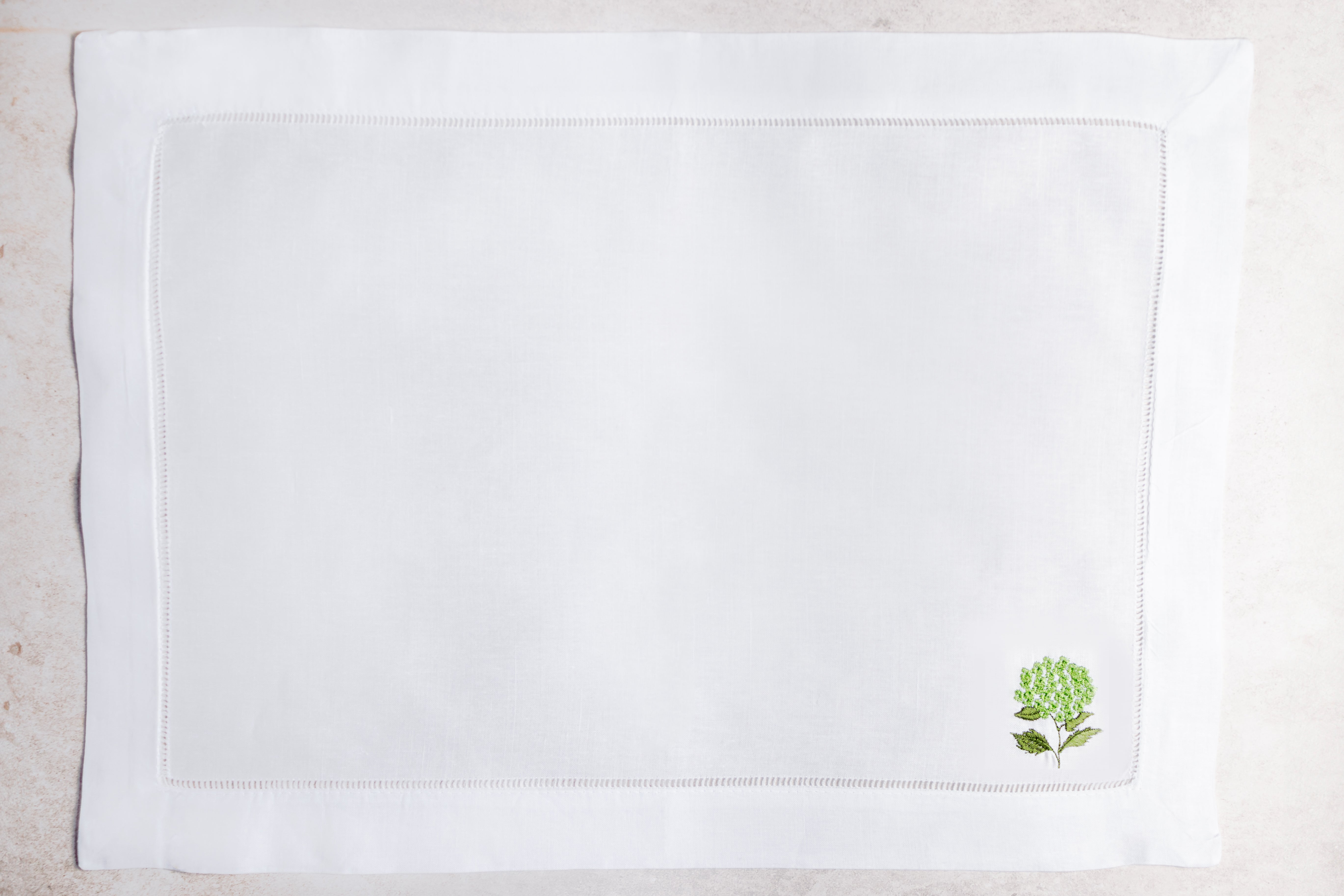 Mantel individual de lino