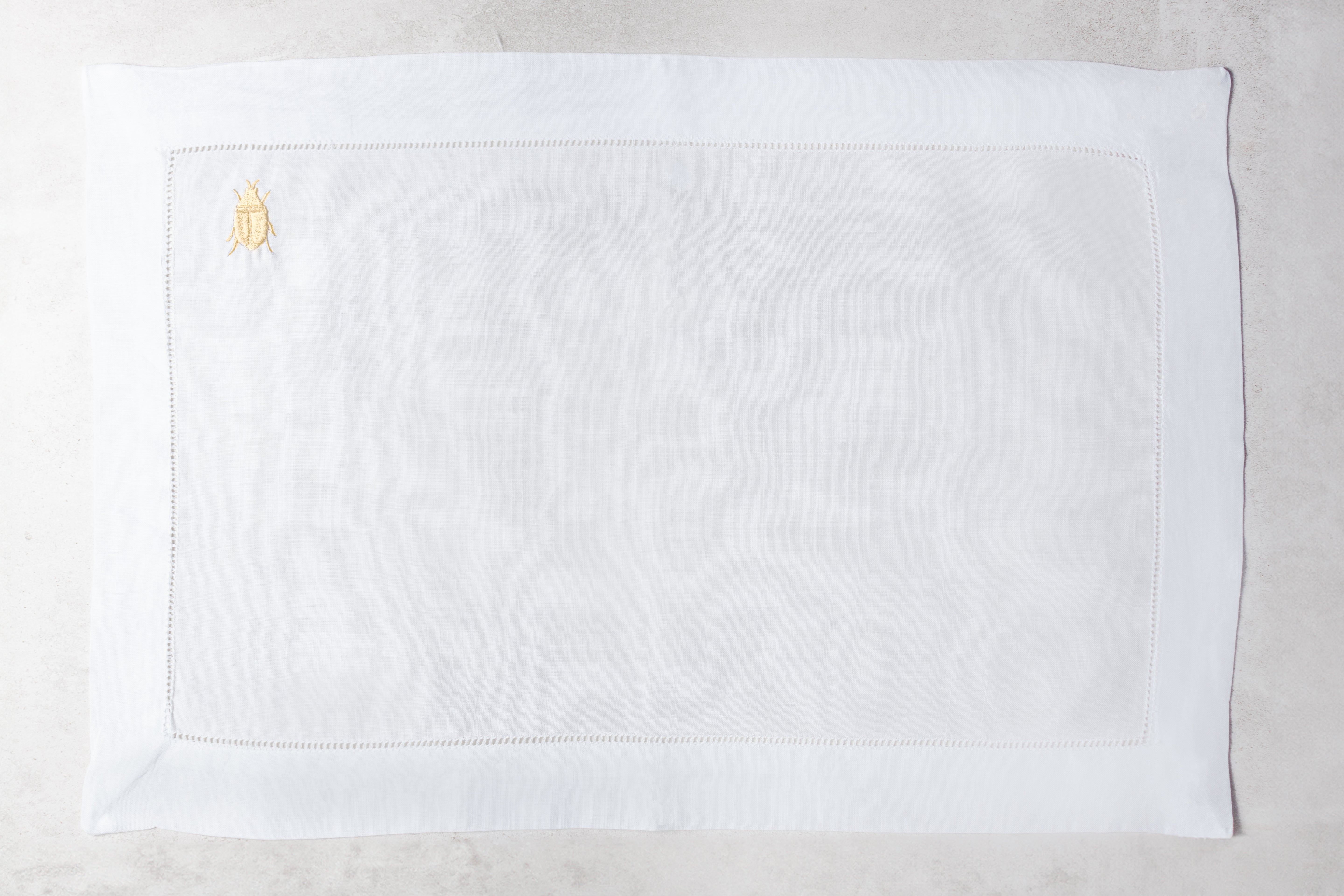 Mantel individual de lino