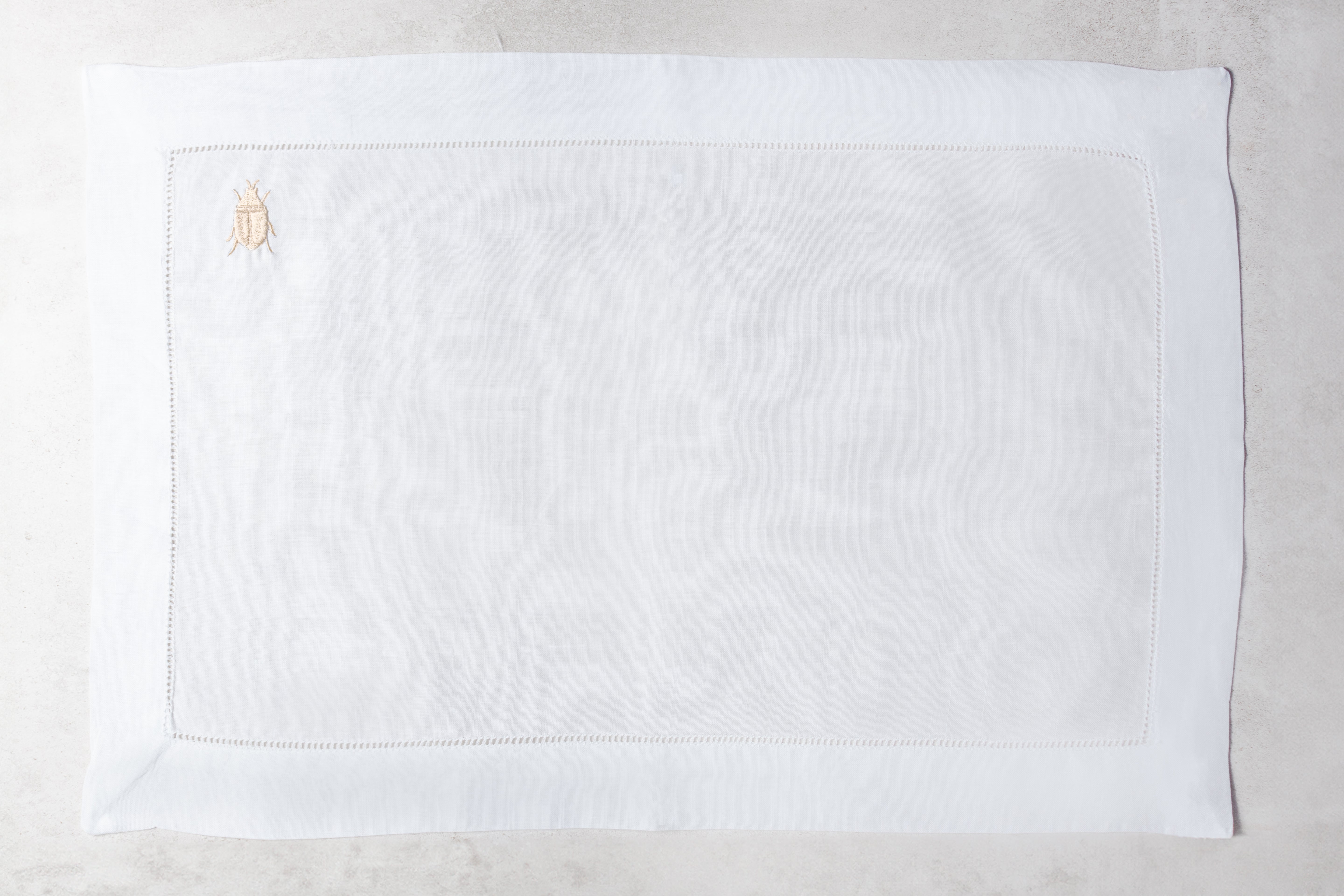 Mantel individual de lino