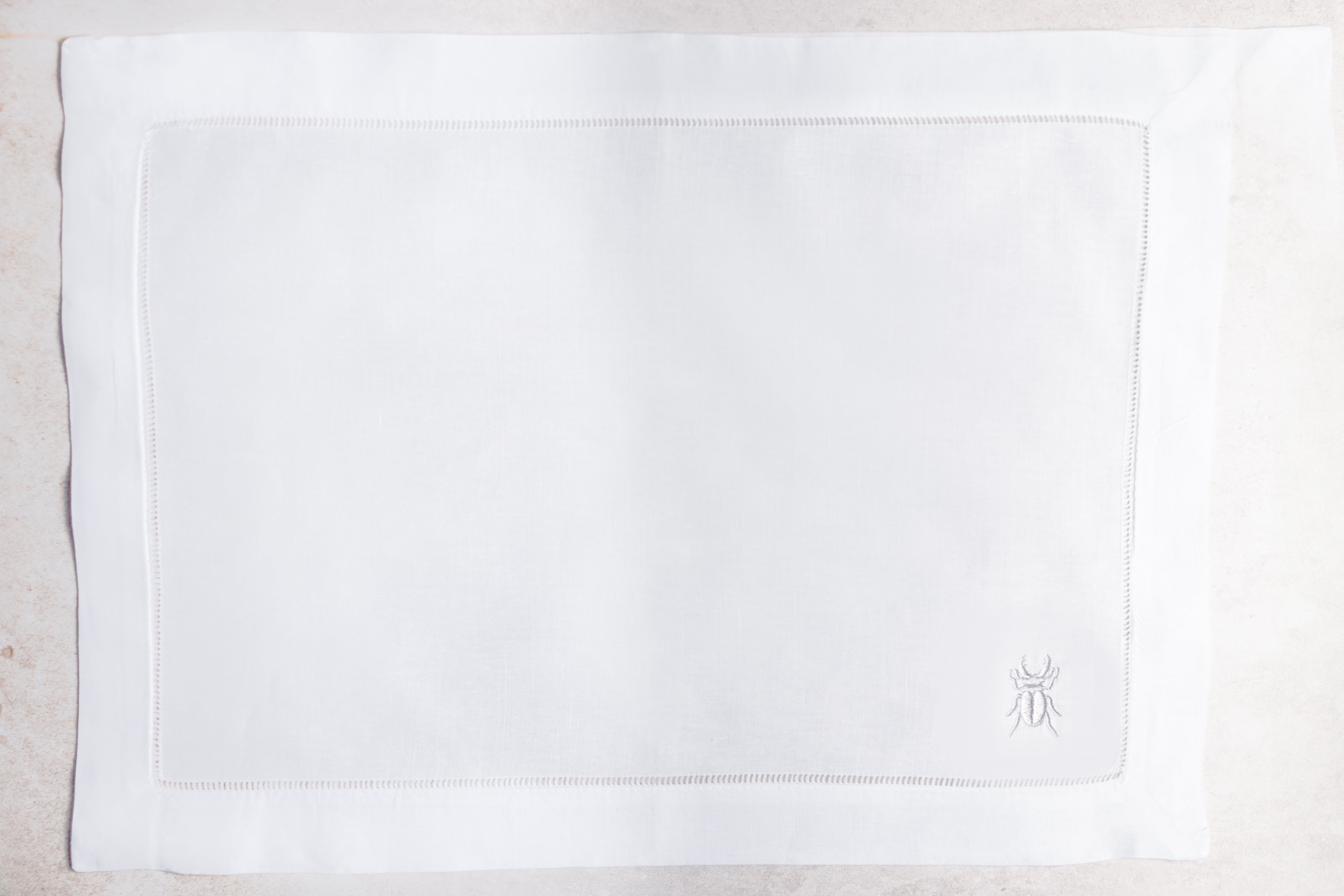 Mantel individual de lino