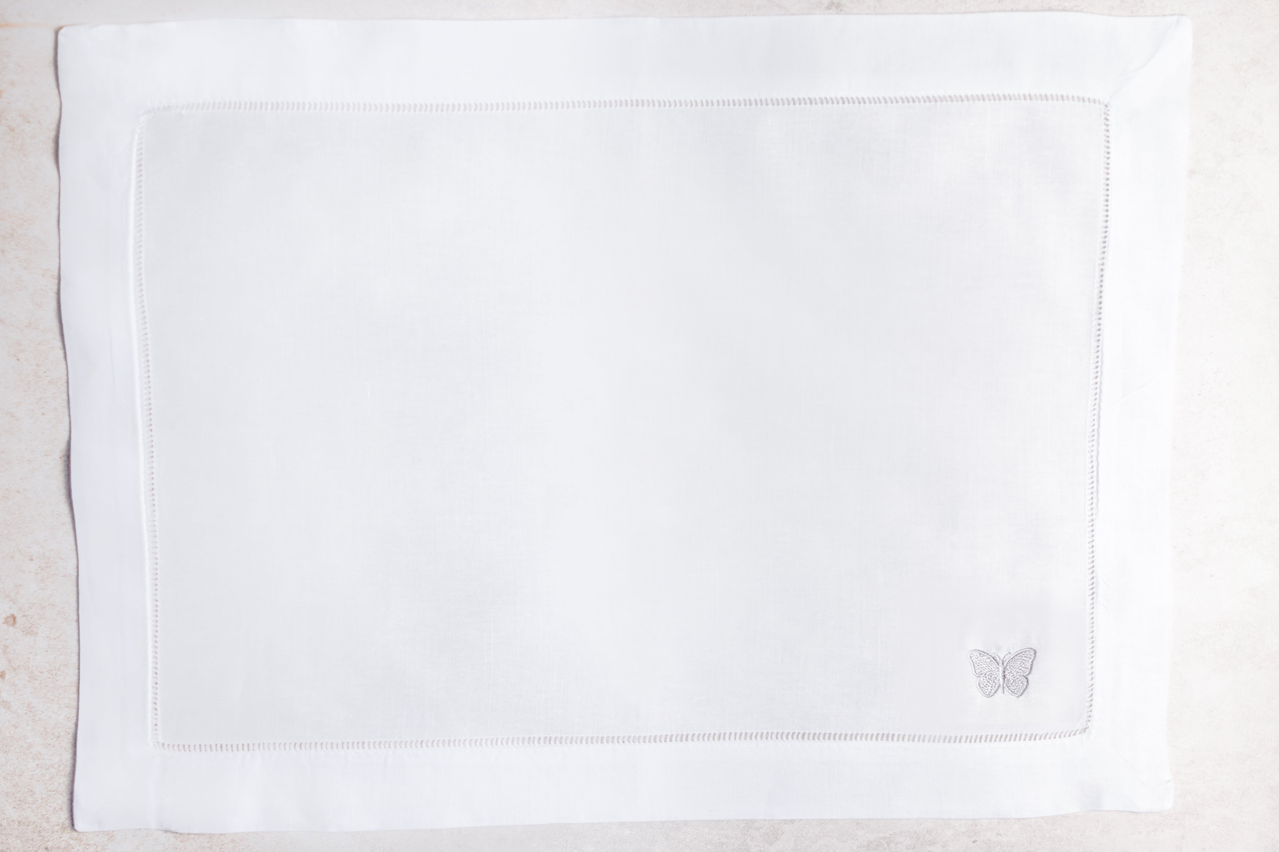 Mantel individual de lino