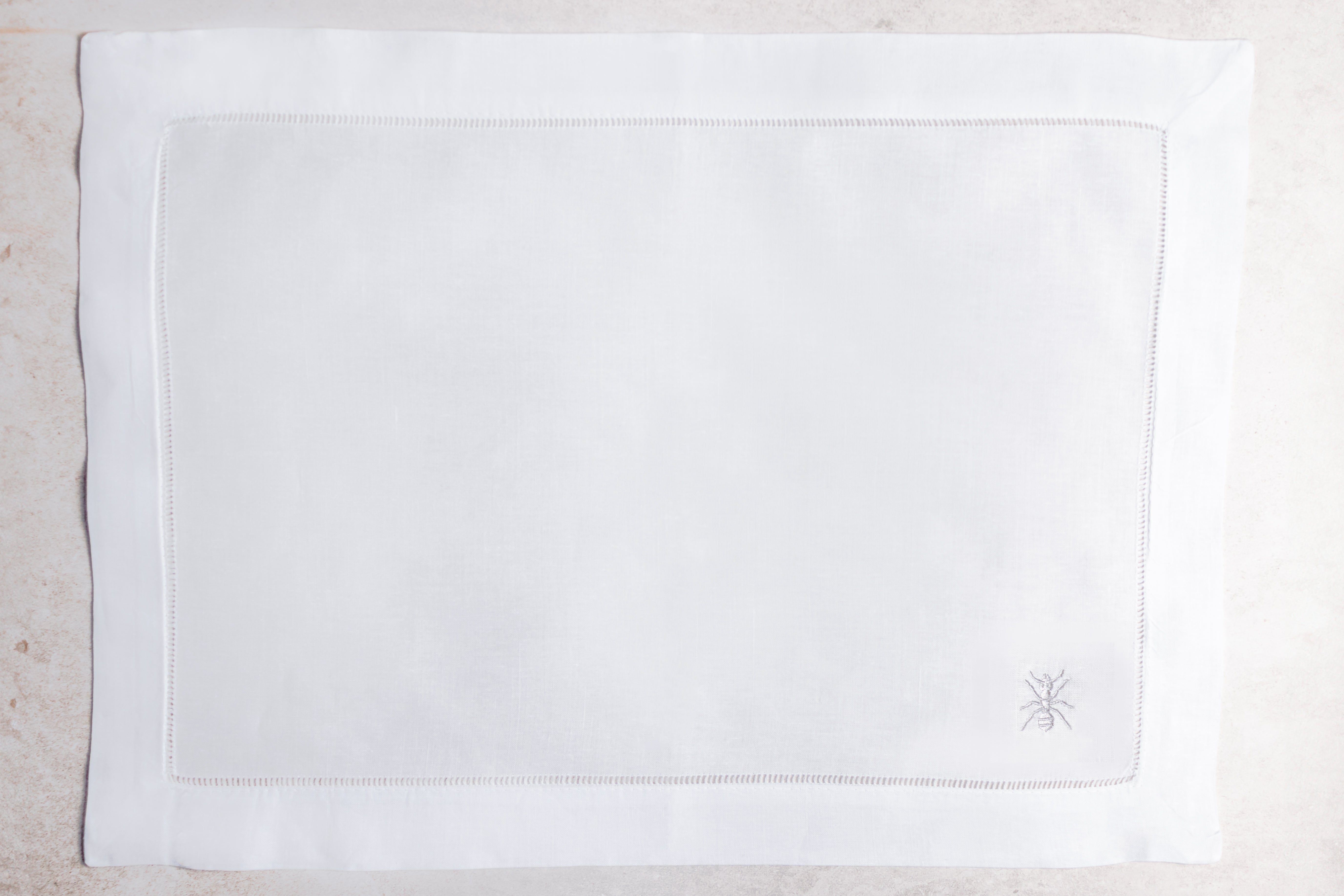 Mantel individual de lino