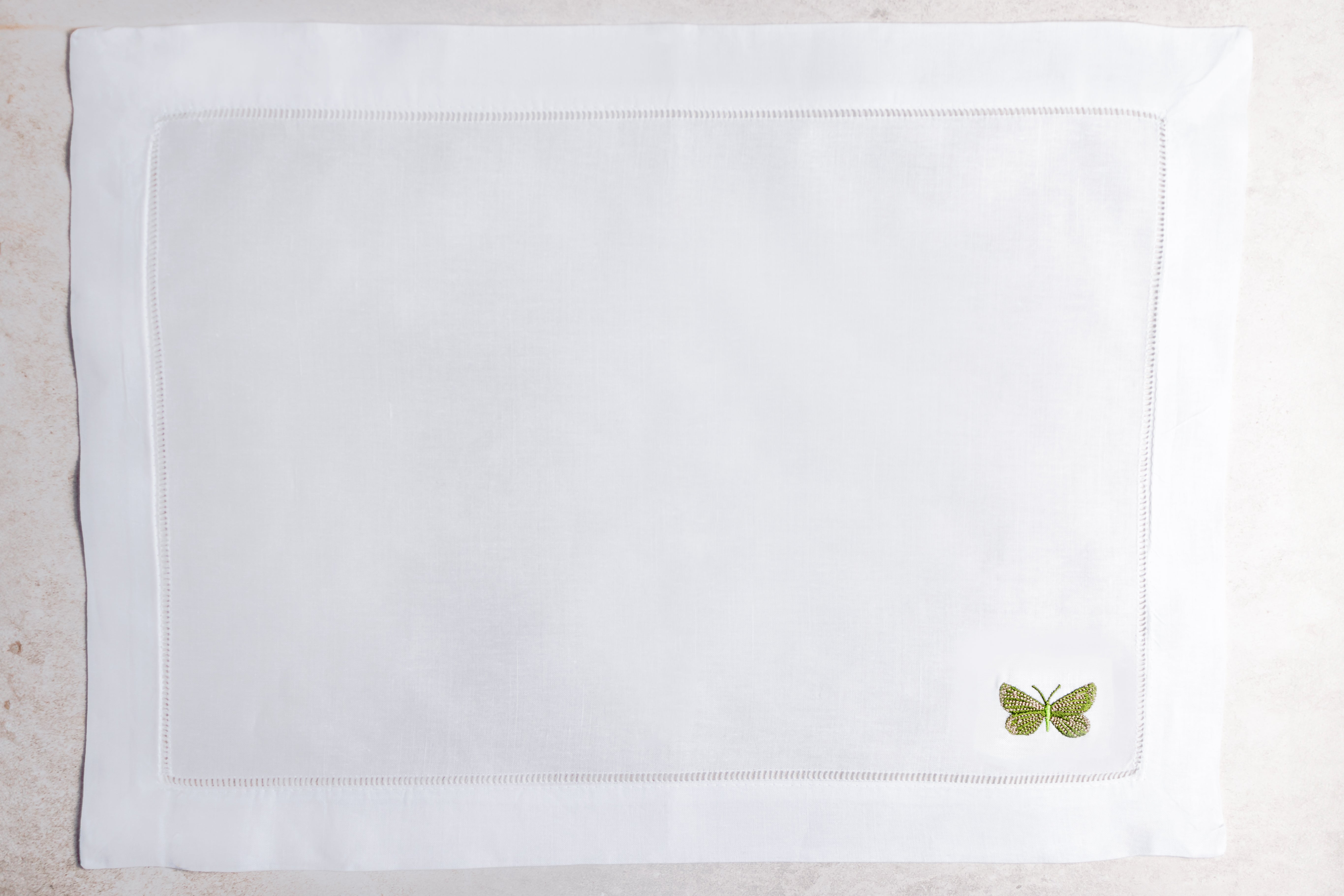 Mantel individual de lino