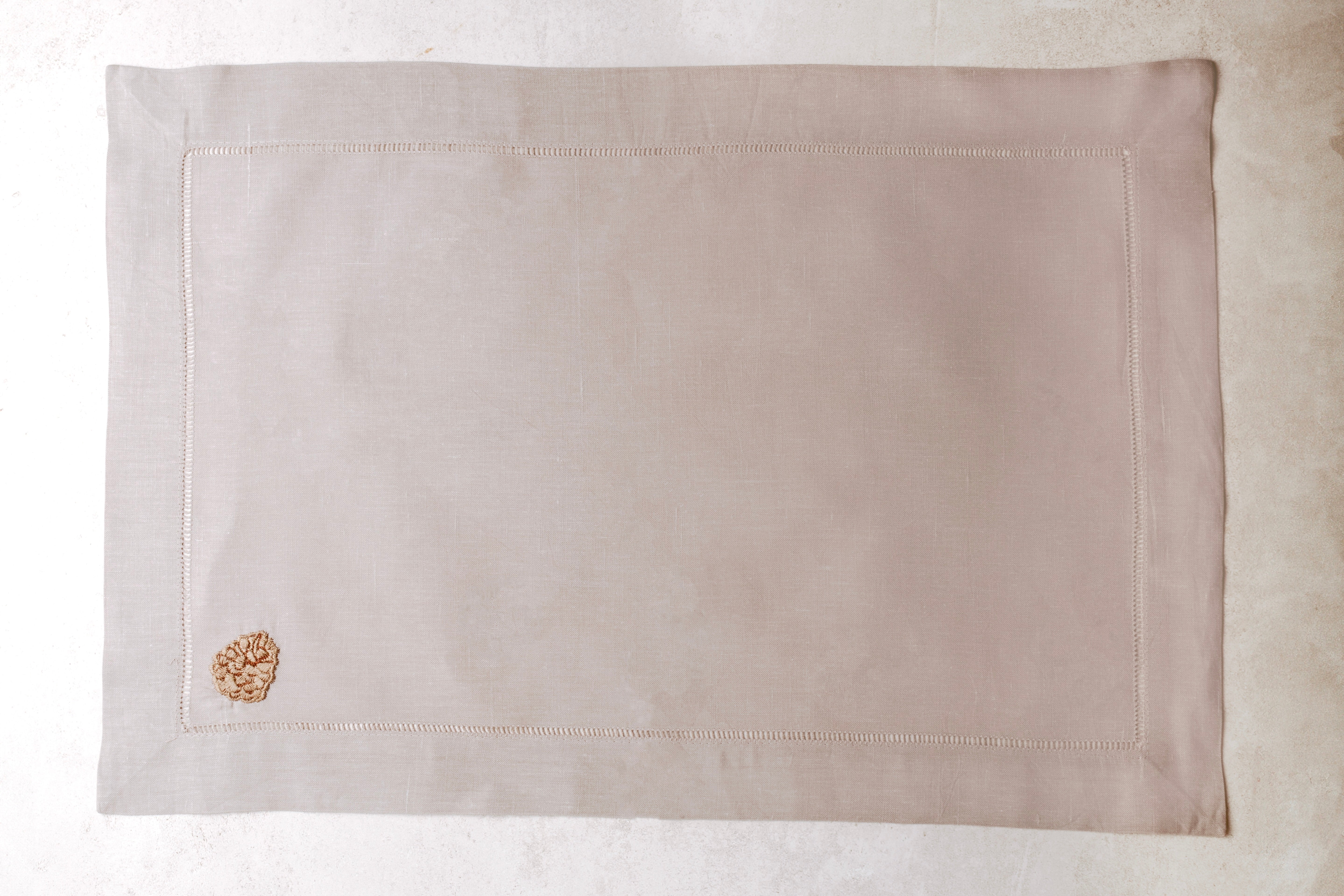 Mantel individual de lino