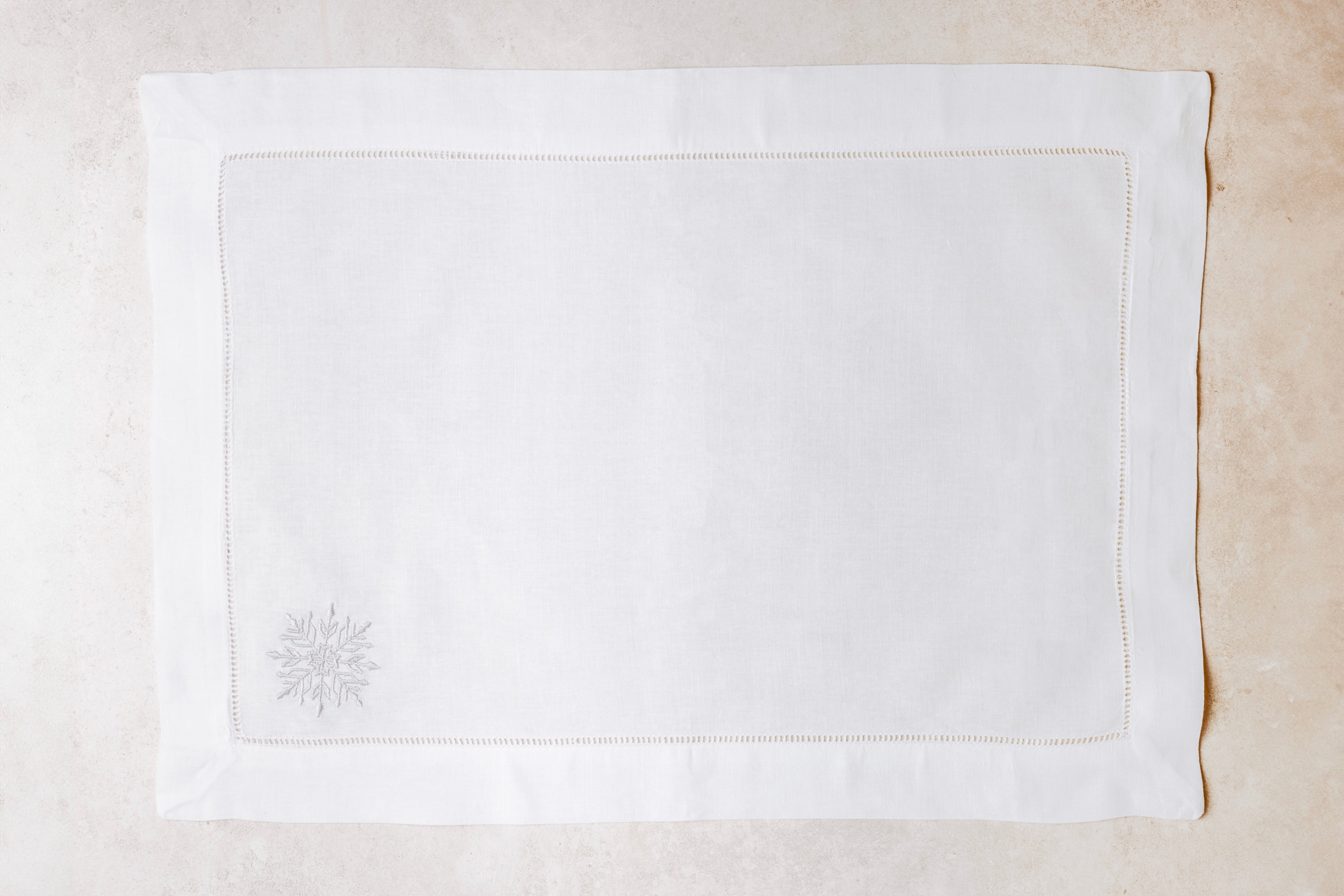 Mantel individual de lino