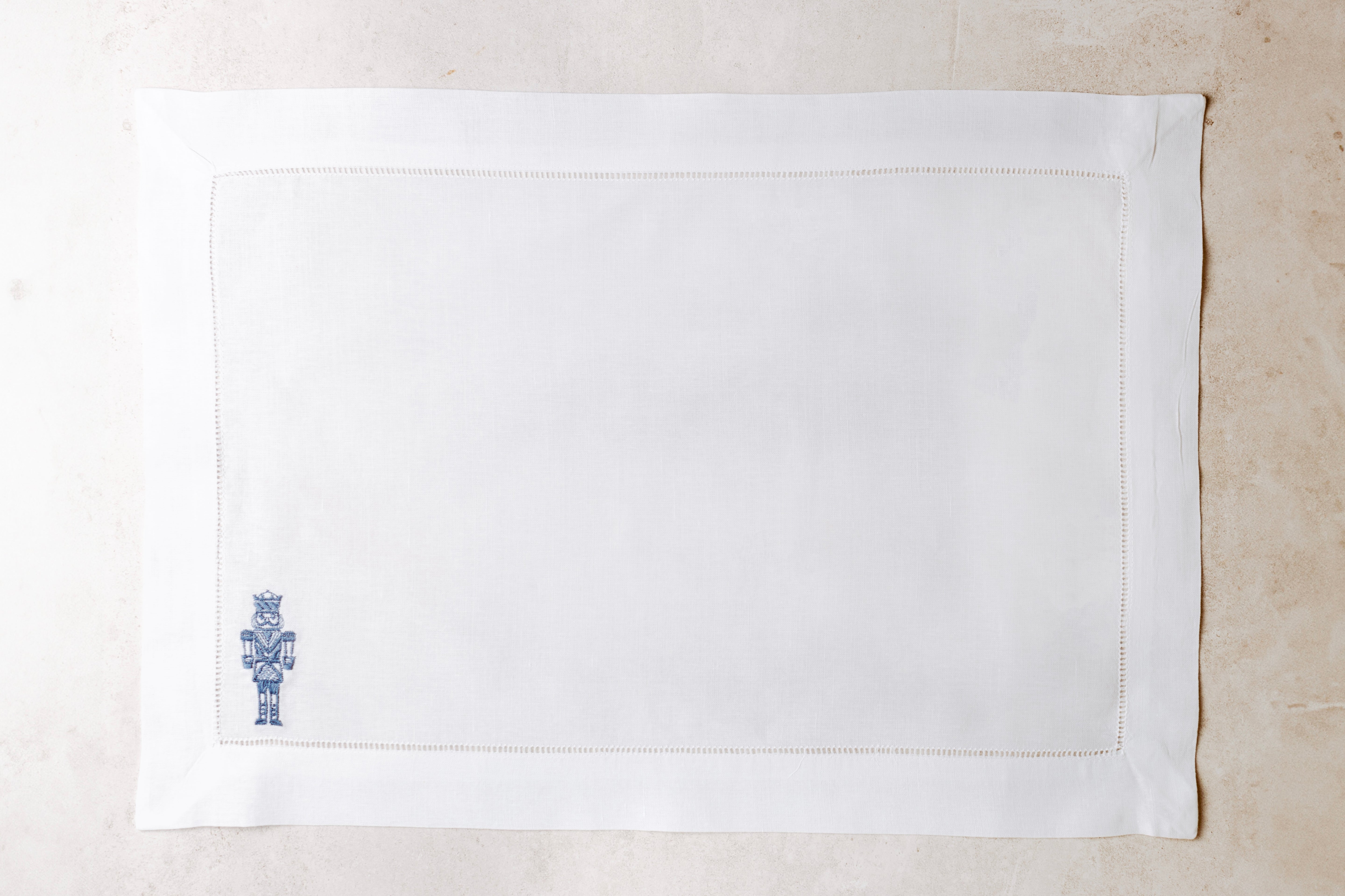 Mantel individual de lino